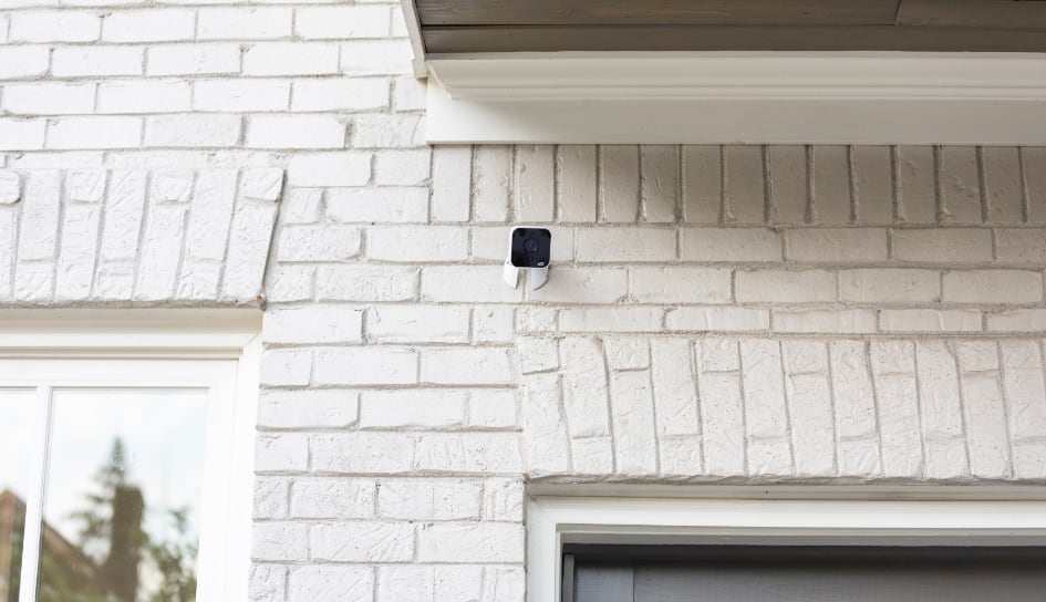 ADT outdoor camera on a Manhattan home